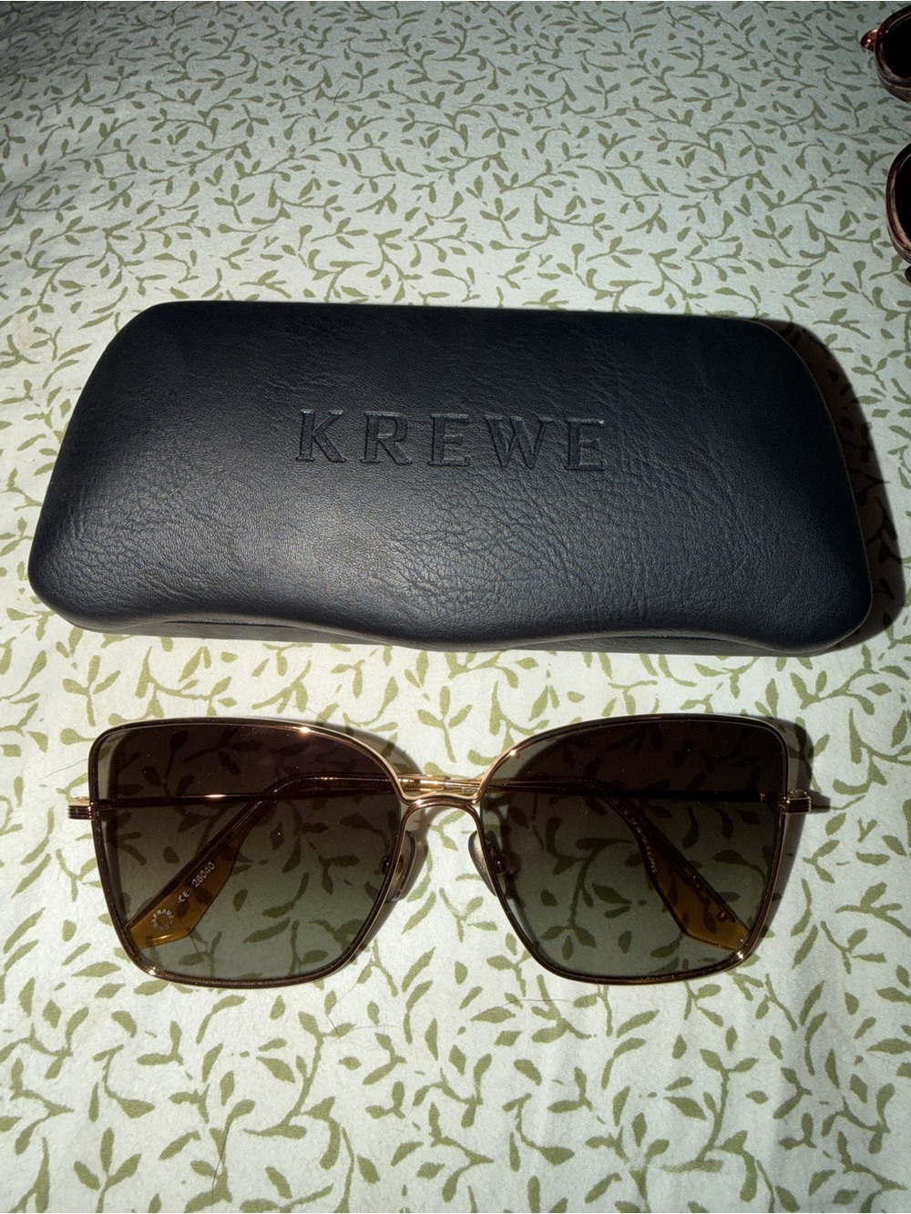 KREWE Gold Frame Sunglasses with Green Polarized Lenses
